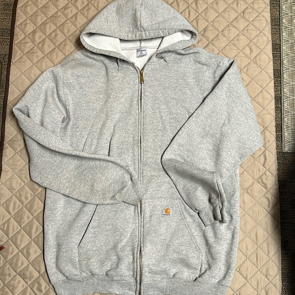 Carhartt. XL tall zip up. See staining on sleeves. Priced accordingly.